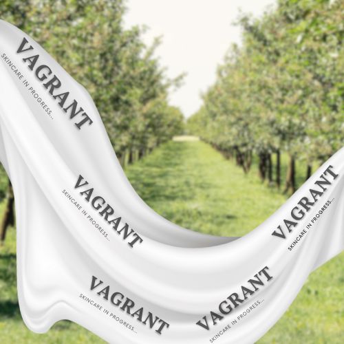 Embodying brand values of purity and elegance with a white silk shirt showcasing the brand name, set against a serene natural backdrop, symbolizing sustainability and luxury.